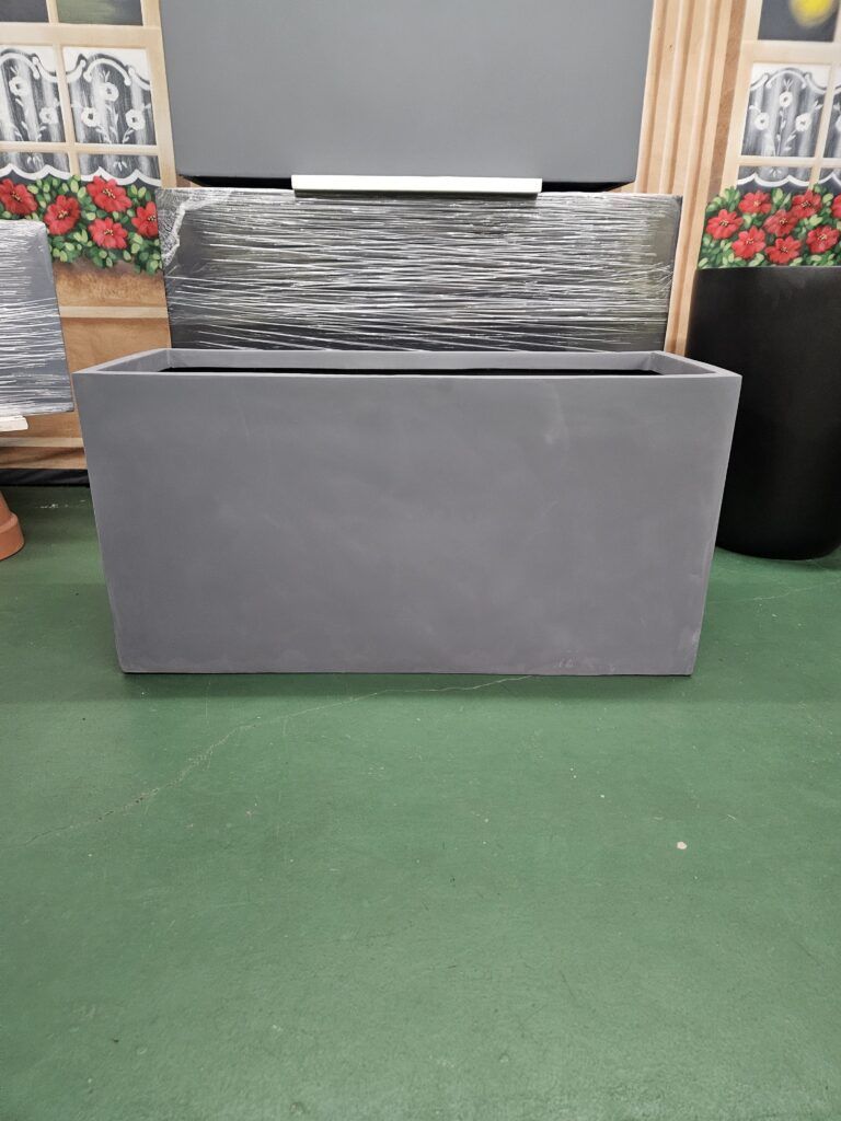 A large gray rectangular planter box